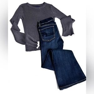 American Eagle jeans and gray sweater